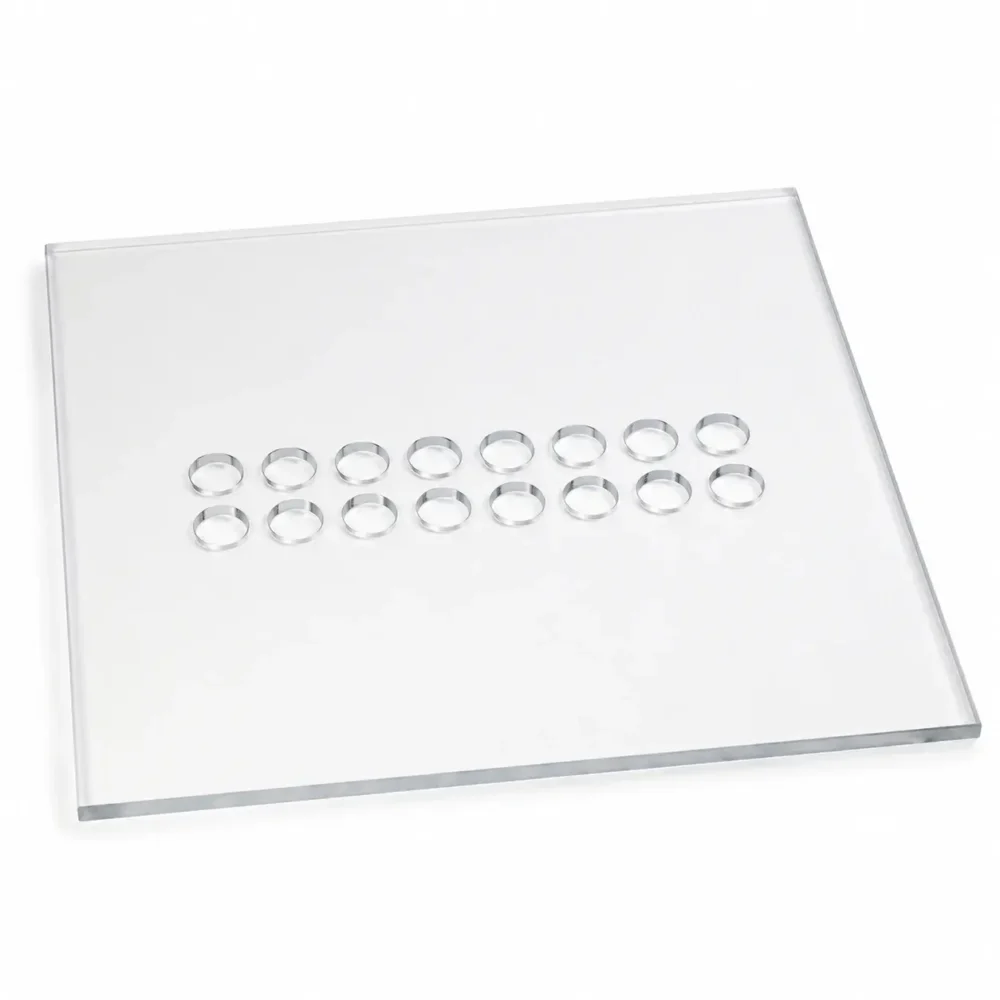 Plaque polycarbonate compact fraisée avec 16 logements circulaires Ø26 mm